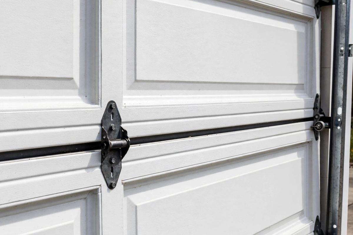 Garage Door Shakes or Jerks Going Up? 6 Likely Causes
